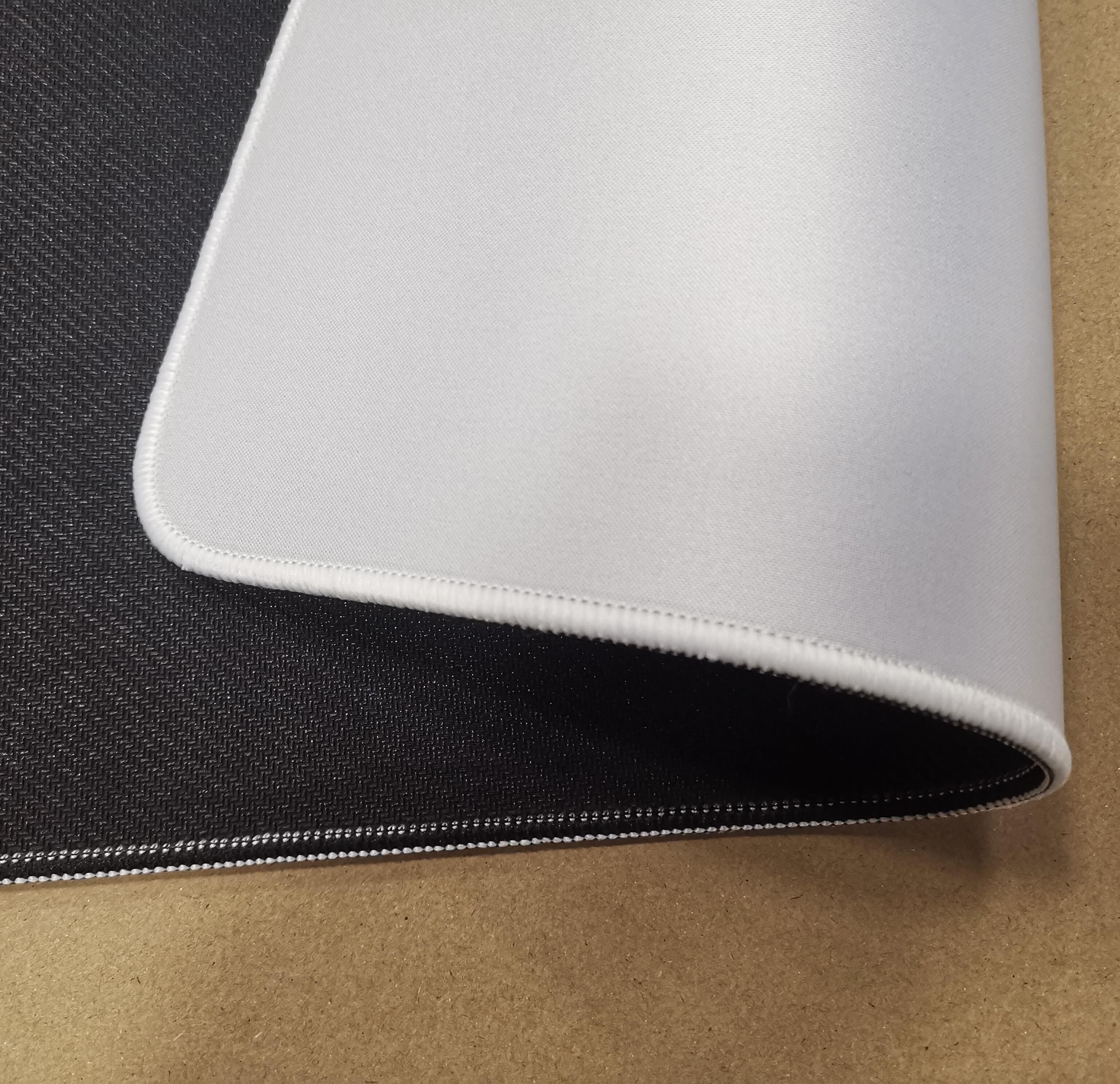 Blank mouse pad with stitched edges for gaming mouse pads